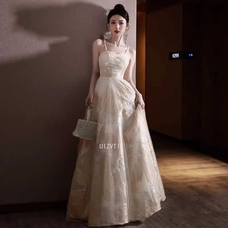 ชุดราตรีแบบไม่มีสายคาดไหล่ แชมเปญ ประดับลายปักดอกไม้สุดหรู ชุดงานเลี้ยงค็อกเทล ผ้าทูลล์คลาสสิก ทรงเอไลน์ยาว ชุดออกงานทางการ