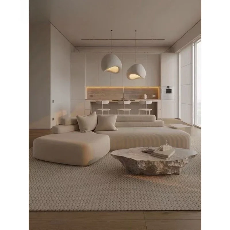 

Диван для гостиной, угловой, нестандартной формы, из ткани, минималистичный, изогнутый, кремового цвета, в стиле комбинации современных материалов.