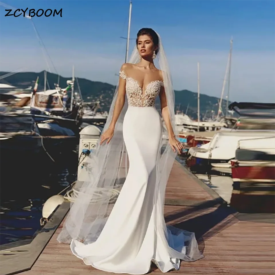 

Customized Charming Ivory Appliques Mermaid Wedding Dress 2025 Sleeveless Backless Sweep Train Tulle Bridal Gowns For Women