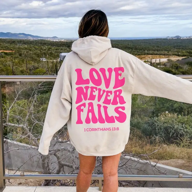 Love Never Fails Hoodie Mental Health Awareness Sweatshirt Women Casual Harajuku Hoodies with Words on Back Pullover Streetwear