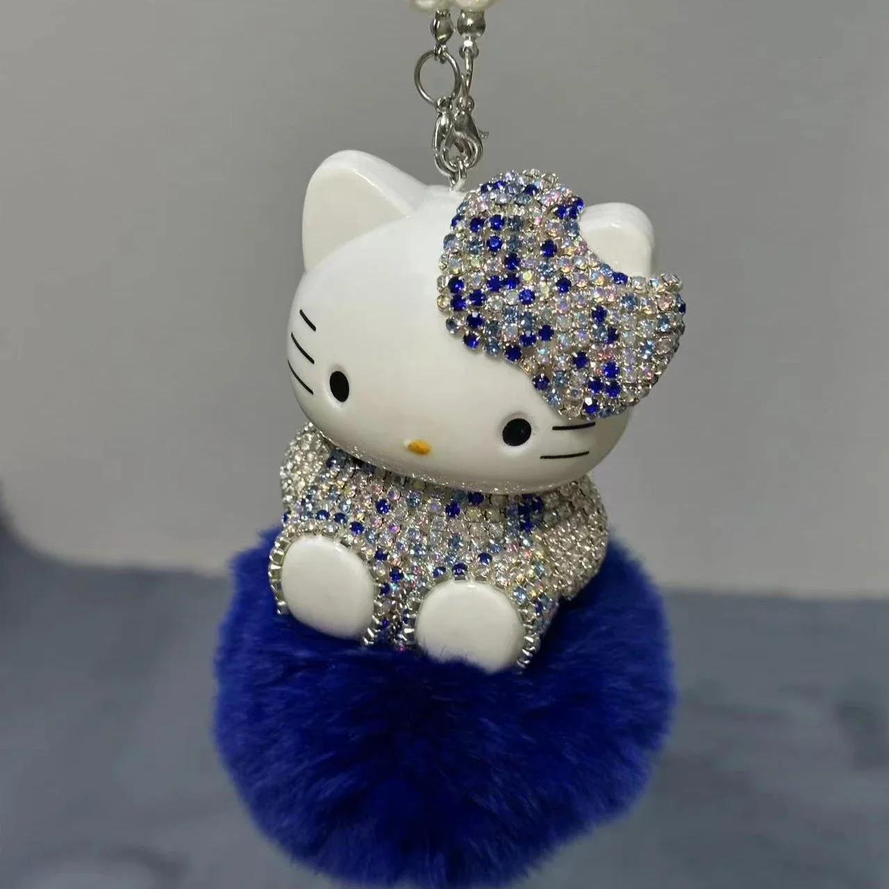 MINISO HelloKitty Car Hair Ball Diamond Pendant Car Pendant Interior Ladies Cute Car Rearview Mirror Handmade Decoration Gift