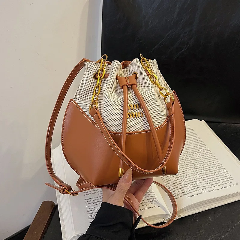 

‌Luxury 2025 Designer Bucket Bag, Fashion Patchwork Canvas Crossbody Bag with Chains, Unique Shoulder Tote