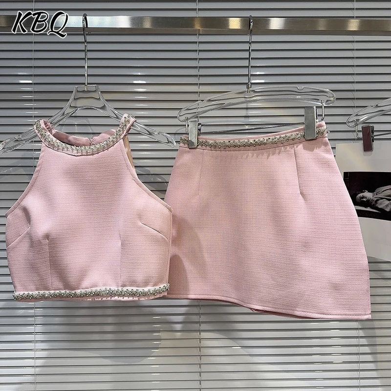 

KBQ Temperament Solid Slimming Two Piece Sets For Women Round Neck Sleeveless Top High Waist Mini Skirt Sexy Set Female Style