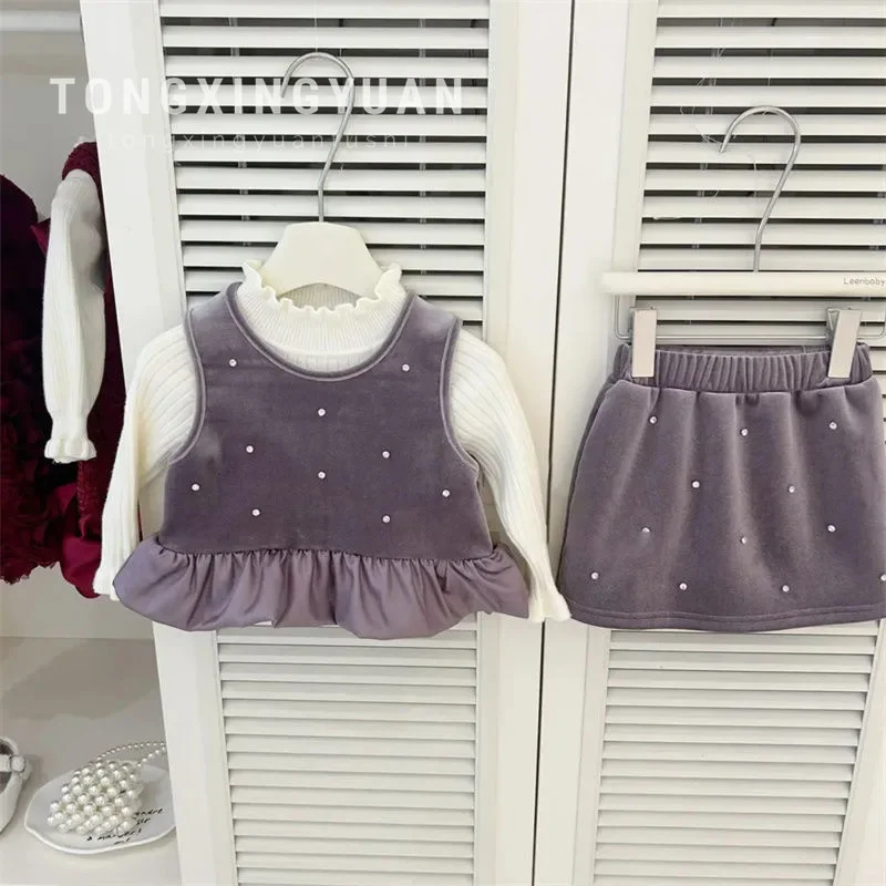 

Korean version of girls' winter new Chinese New Year clothes, purple bright diamond top, velvet fashionable skirt suit trendy