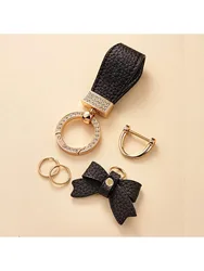 High end artificial diamond car keychain pendant, exquisite pink bow, lychee pattern hand rope keychain, exquisite ins car chain