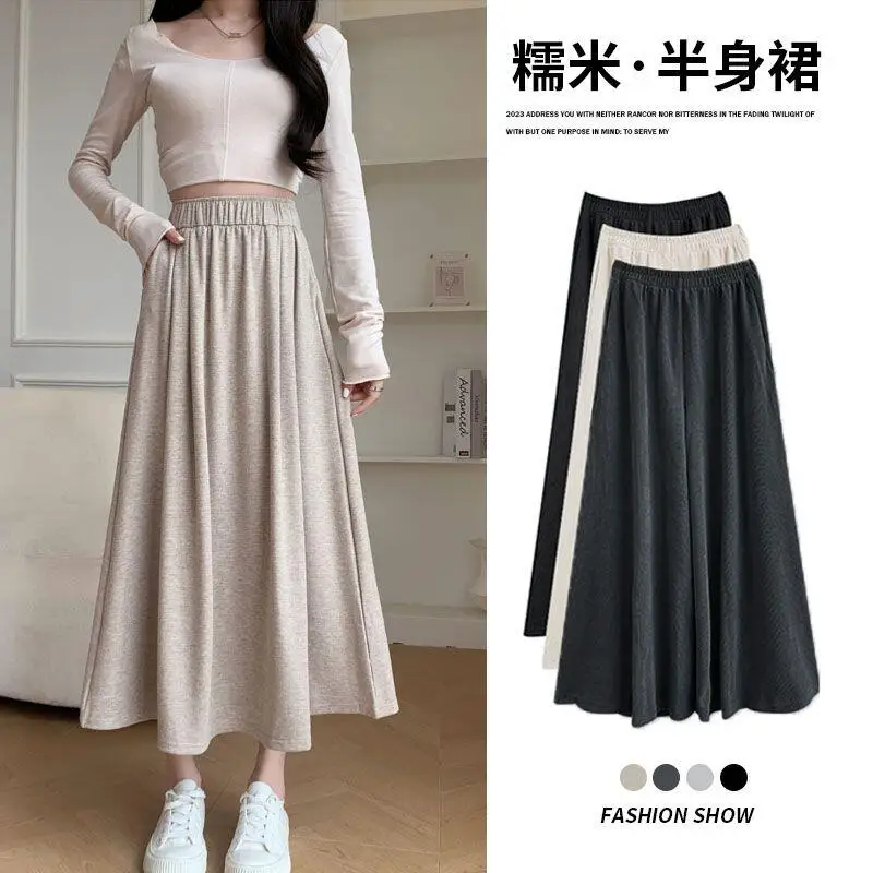 Gonna da ragazza Anni primaverili e autunnali Nuovo modello Gonna a ombrello di media lunghezza a vita alta Shorty Gonna lunga drappeggiata pigra Dopamina Hot