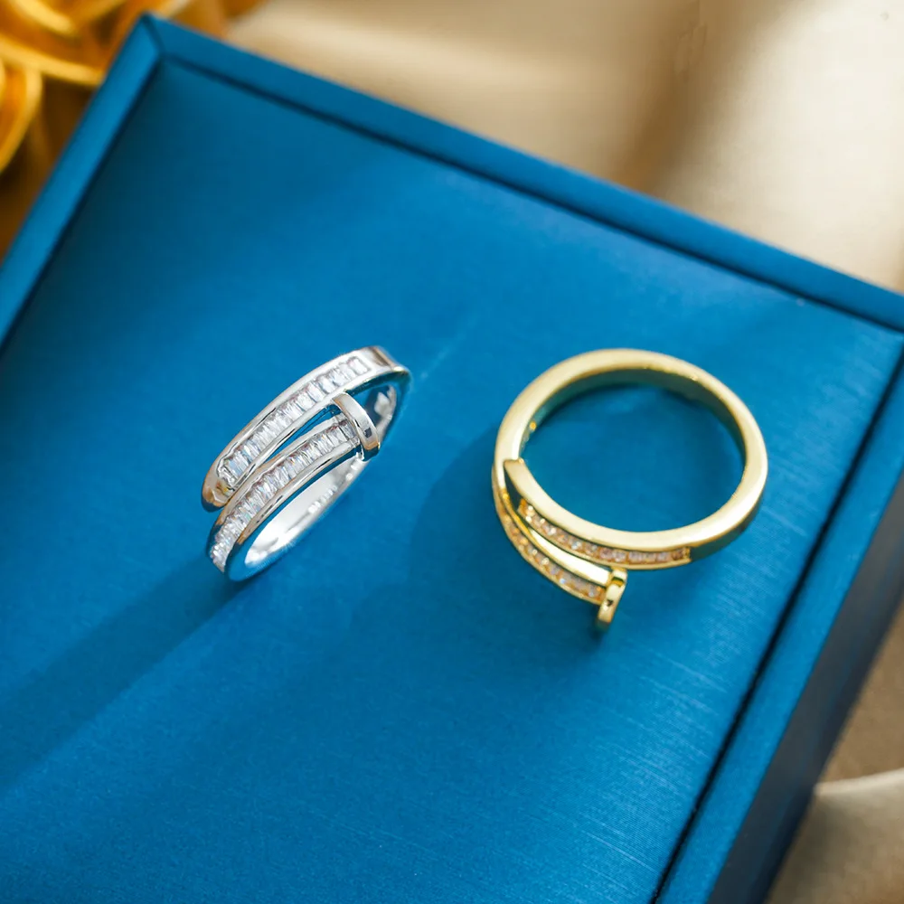 This is a latest unique, light luxury and niche design of a women's zircon ring with an open ring and a cool style.