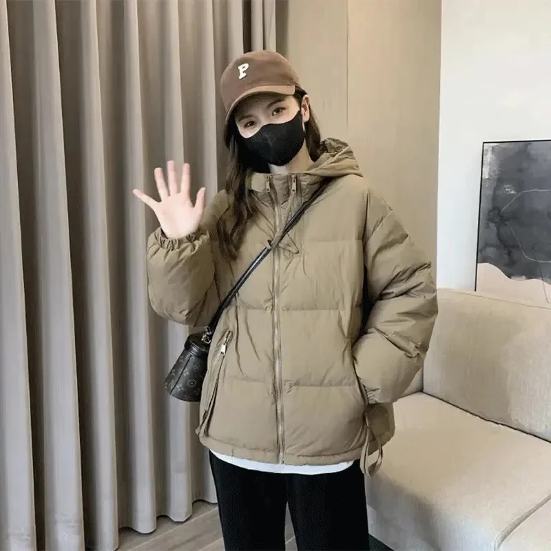 Neue Baumwolle Jacke frauen Baumwolle Gefütterte Mantel Kurze Koreanische Version Verdickte Kapuze Winter Verlieren Mode Mantel Parka