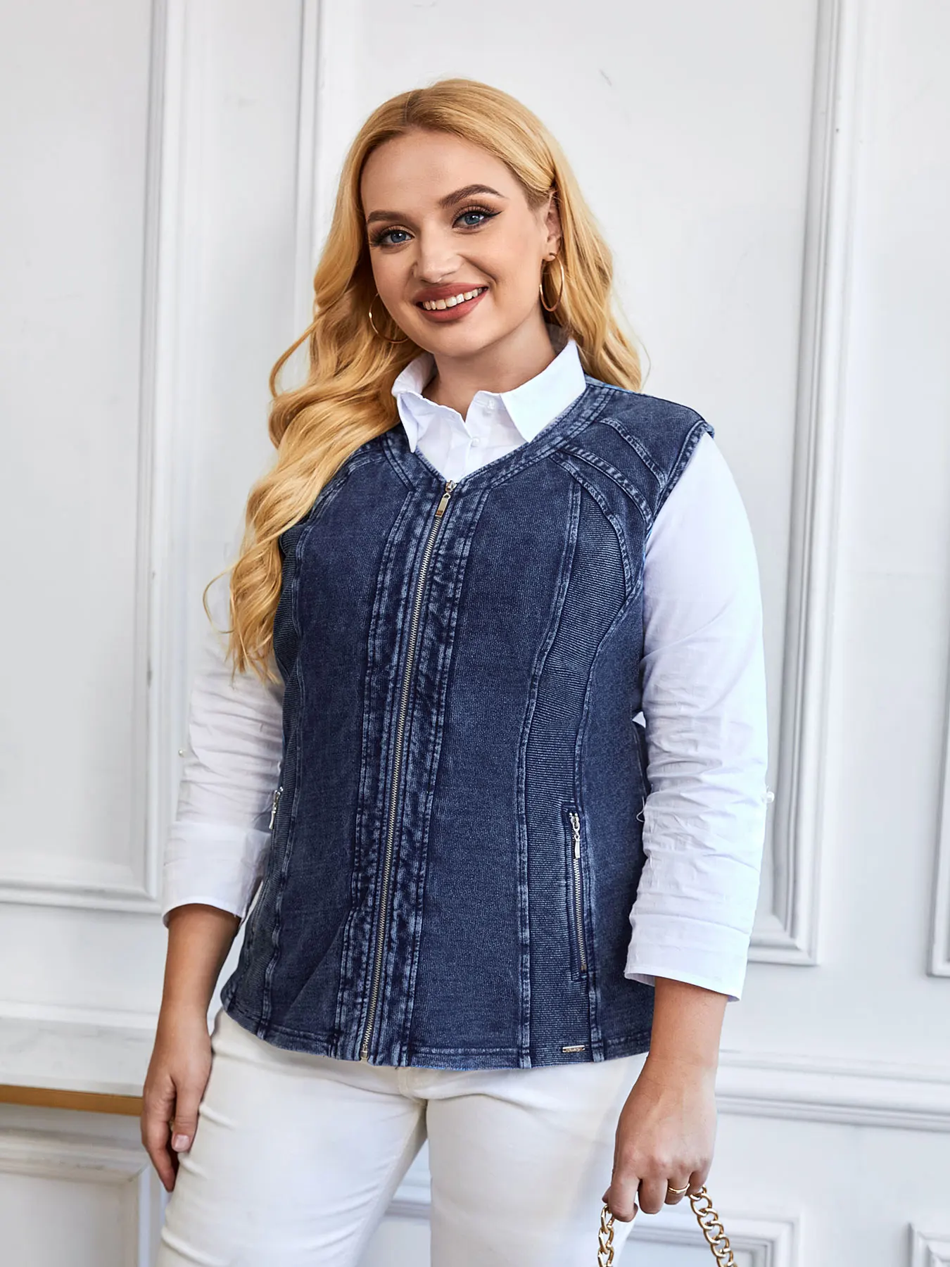 

Женский вязаный жилет больших размеров на весну и осень