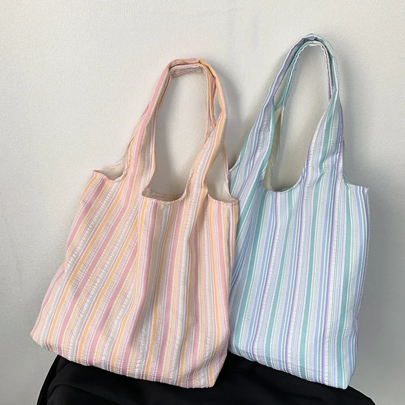 

2026 New Korean Style Striped Canvas Tote Bag Women Large Capacity Single Shoulder Commuter Armpit Bag Student Class Travel Bags