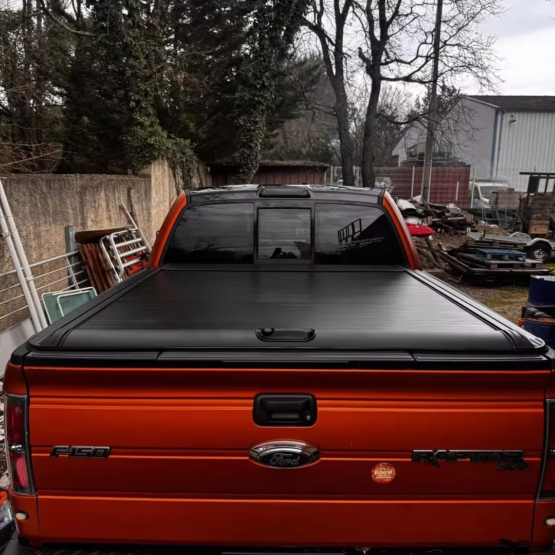 

Роллетная крышка кузова (тент) для пикапов: Amarok, Ford F-150, Dodge Ram 1500, Hilux, GMC, Ranger, Wildtrak, Raptor