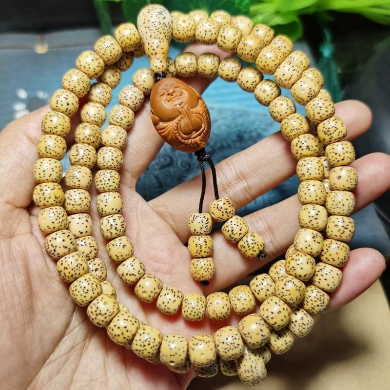 Hainan natural yellow golden Buddha , star-moon seed bracelet, 108 Bodhisattva , 108 barrel beads