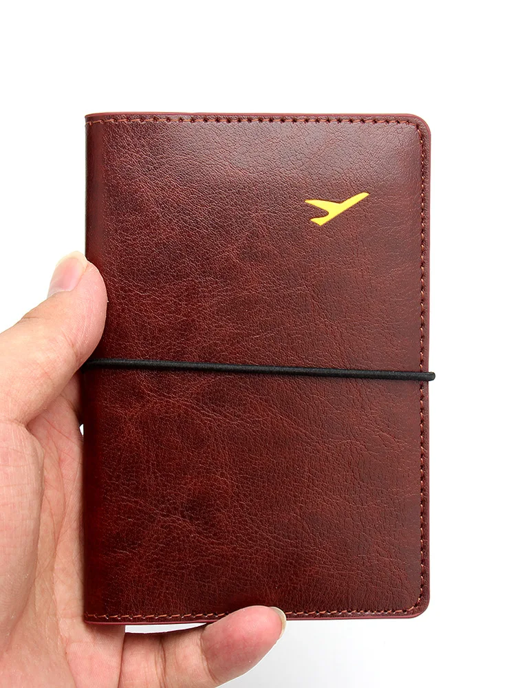 Funda de cuero para pasaporte para hombre y mujer, billetera de viaje ultrafina con banda elástica, antipérdida, tarjetero de crédito