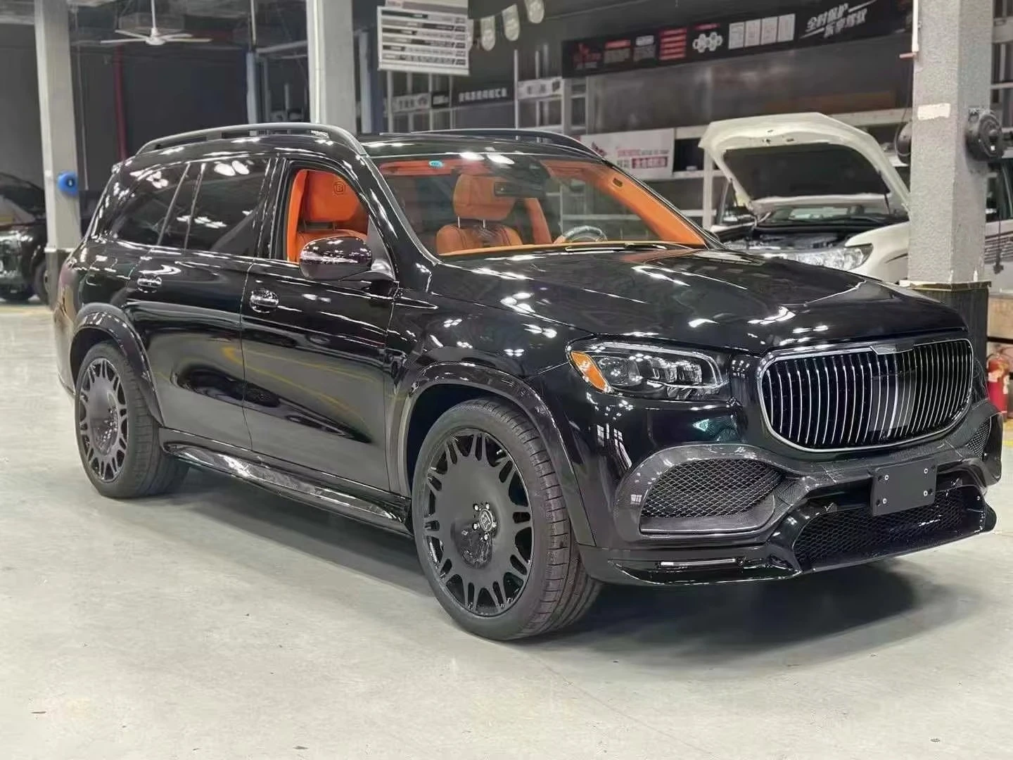 ألياف الكربون قطع غيار السيارات ل GLS ترقية البرازيلي حافلة طقم الجسم مصدات السيارة عجلة الحاجب الخلفي الناشر الجناح العلوي