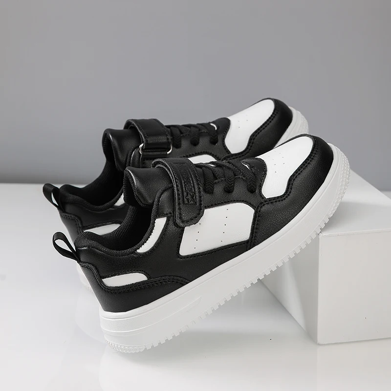 A pair of children's casual leather sneakers with adjustable strap, durable sole for outdoor and daily activities JJ-790