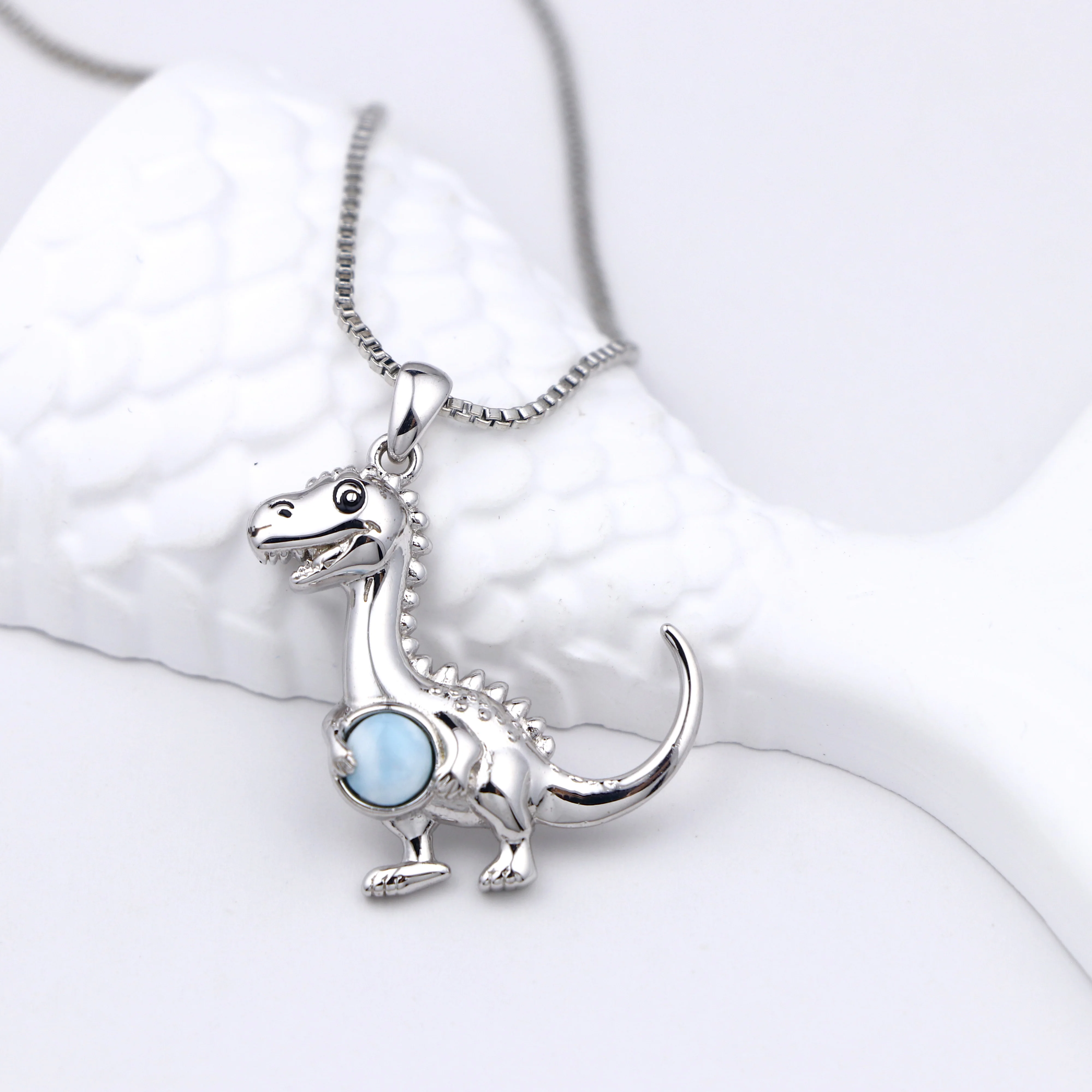 

Trendy Dinosaur Necklace: Rhodium Plated Copper Pendant with Genuine Larimar Gemstone, Fashion Jewelry Gift for Women