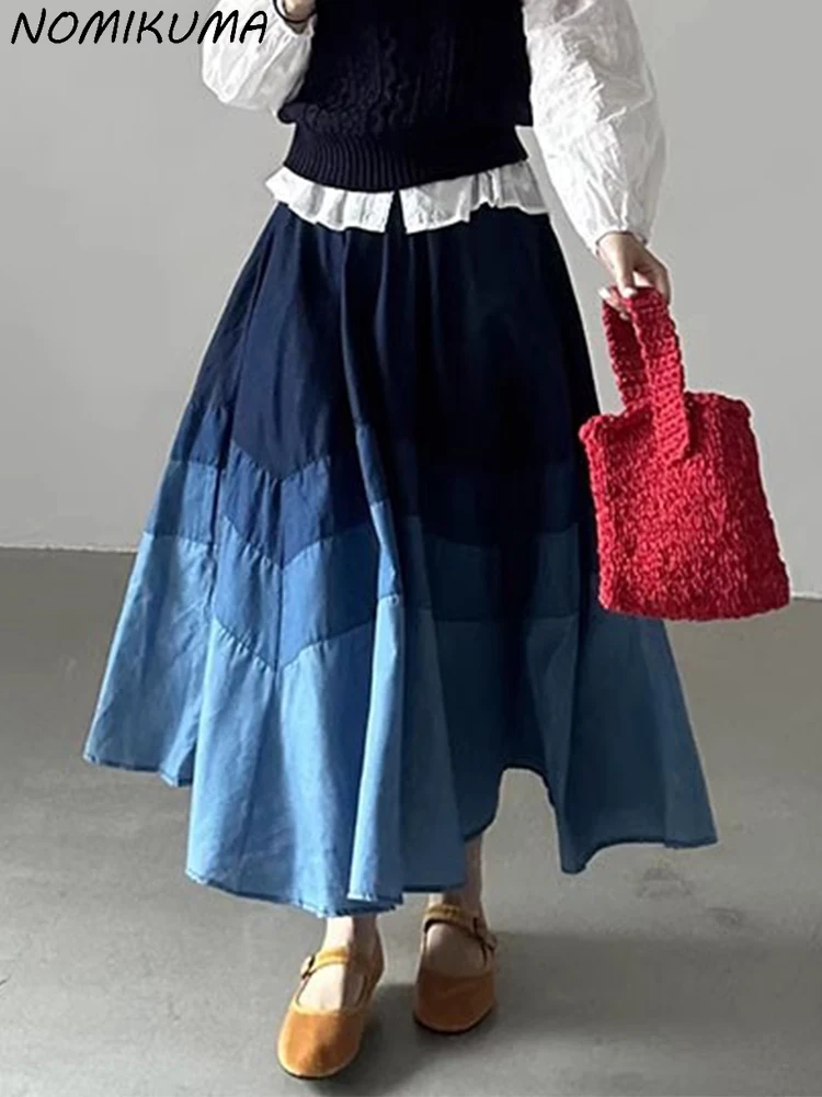 

Nomikuma Korean Spring Retro Elastic Waist Versatile Slim Colored Mid Length Large Swing Half Skirt Umbrella Skirts for Women