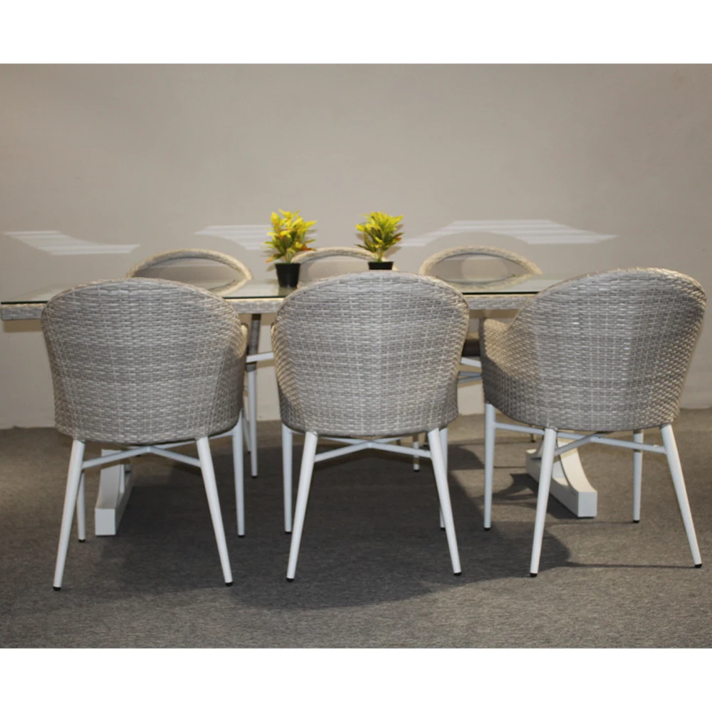 Sconto 7 pezzi di lusso in rattan PE set da pranzo impermeabile Foshan prezzo di fabbrica sedia e tavolo da giardino per esterni