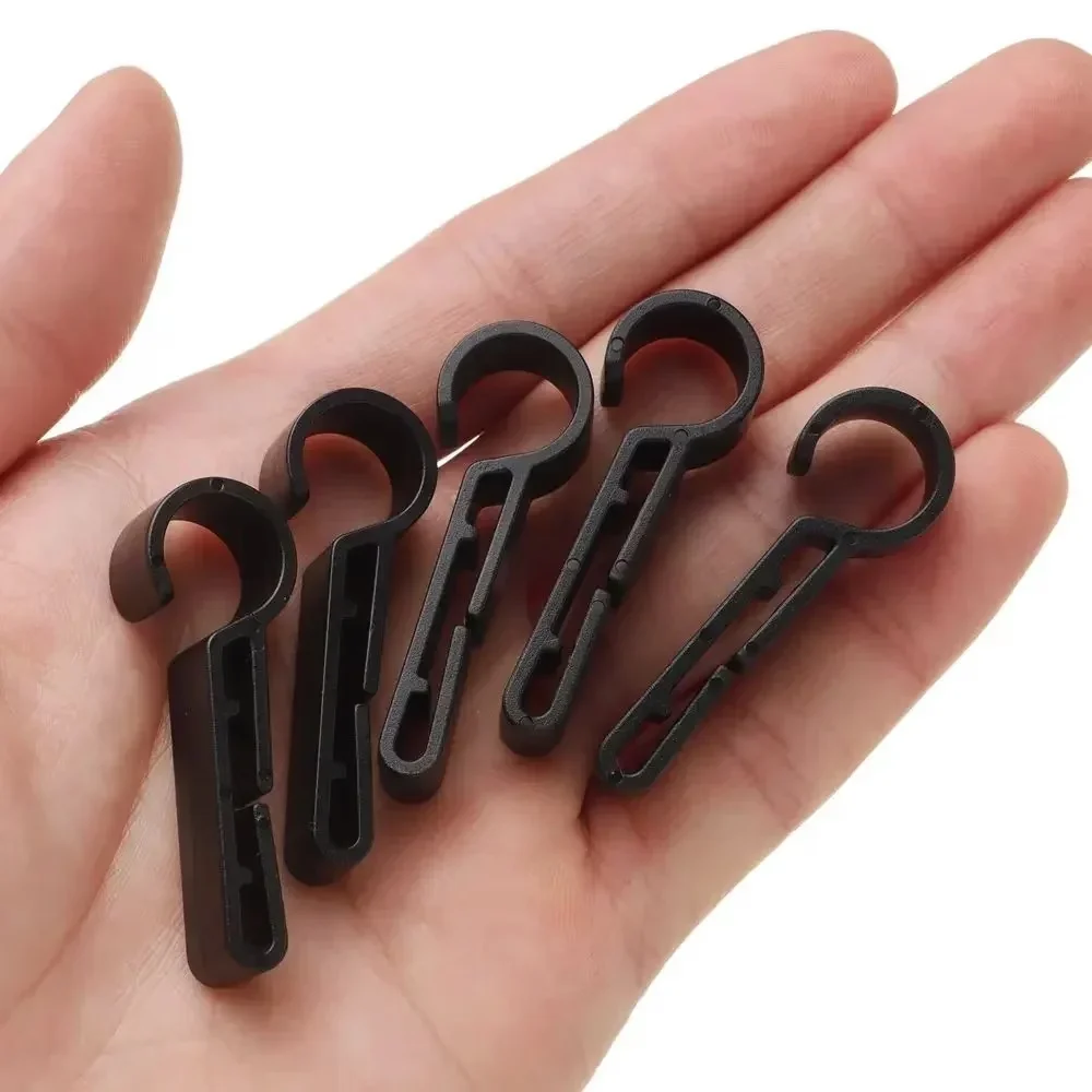 Set of 10 Clips for Attaching Headlamps to Hard Hats, Designed to Secure Headlamps During Outdoor Activities.