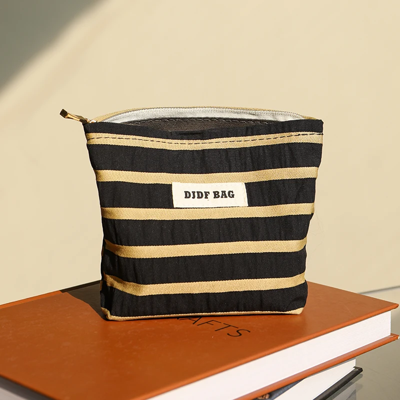 New women\'s cosmetic bag, small striped portable sanitary napkin storage bag, commuter coin purse, portable lipstick envelope