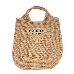 Spring and summer hollowed-out one-shoulder tote bag embroidered letter paper rope straw woven bag women's portable beach bag