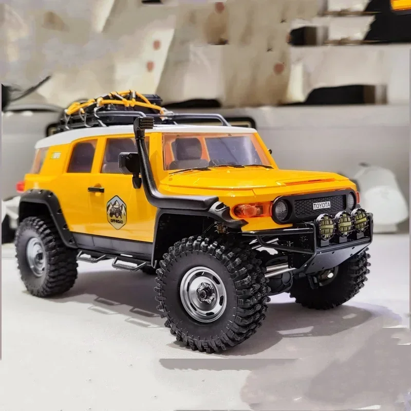 Nowy Model samochodu Fms 1:18fj Cruiser Model Rc zdalnie sterowanym samochodowym wspinaczki symulacyjnej elektryczny samochodzik zabawkowy prezenty dla chłopców