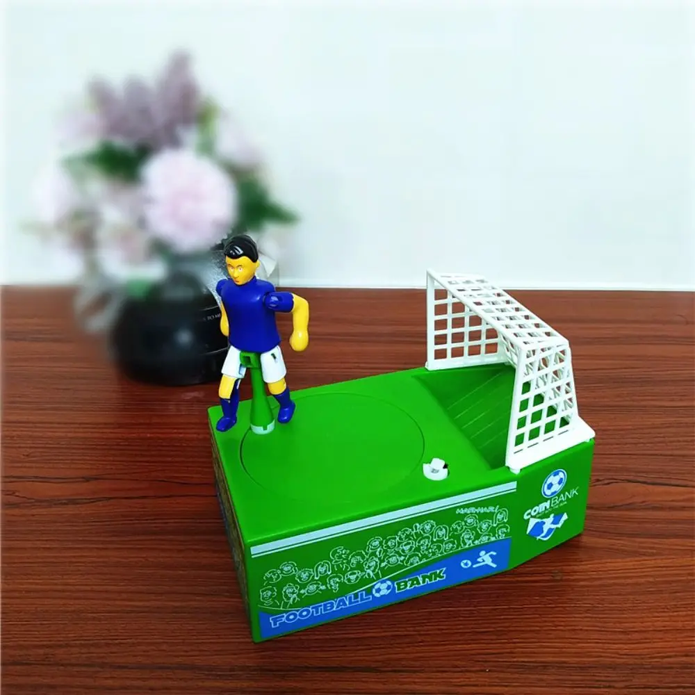 Giocatore di calcio Salvadanaio di calcio Scatola di immagazzinaggio Campo di calcio elettronico Salvadanaio Goal Kicking Portamonete di calcio dei cartoni animati