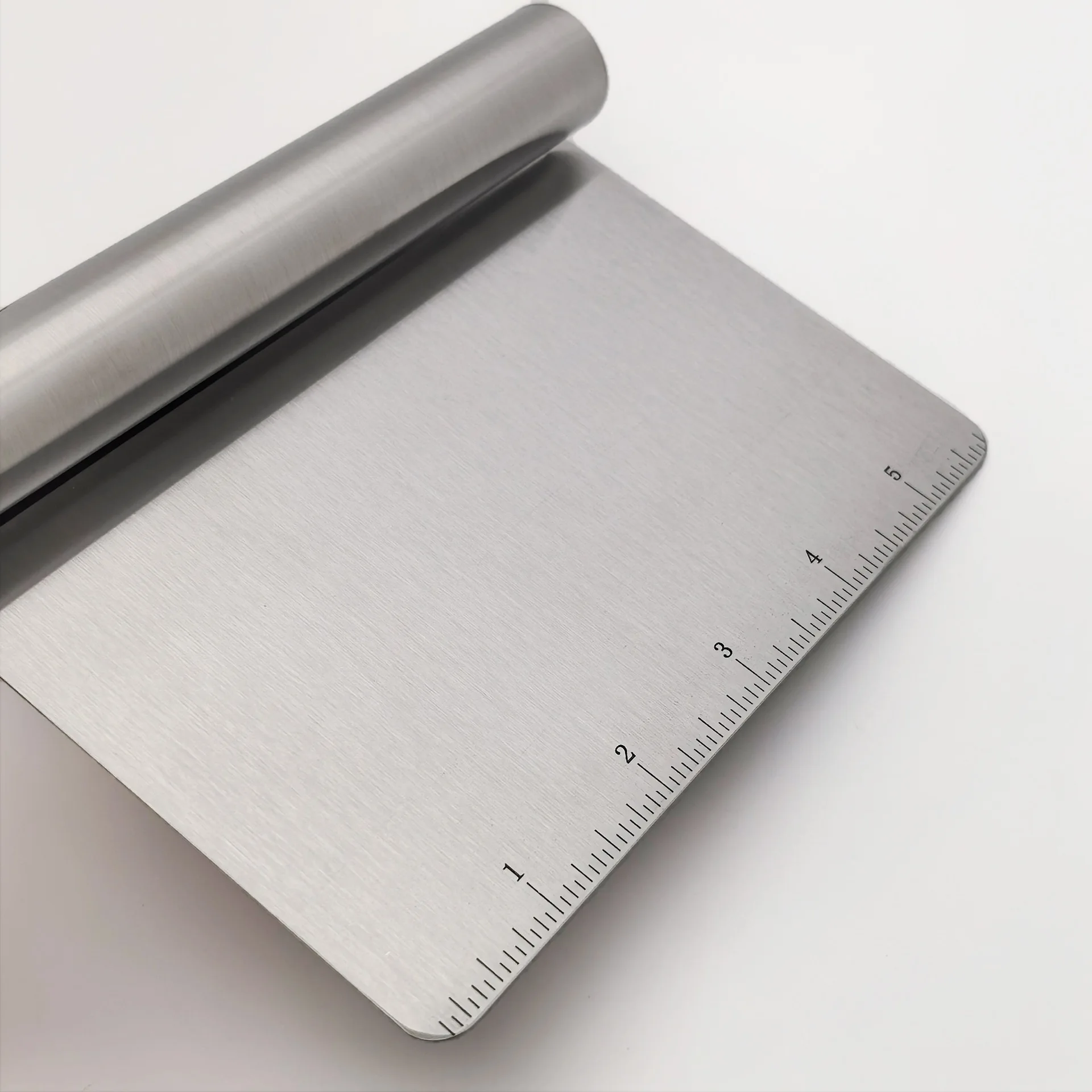 Stainless steel and plastic kitchen noodle cutter with precision scale markings ideal for rice rolls dough butter slicing rounde
