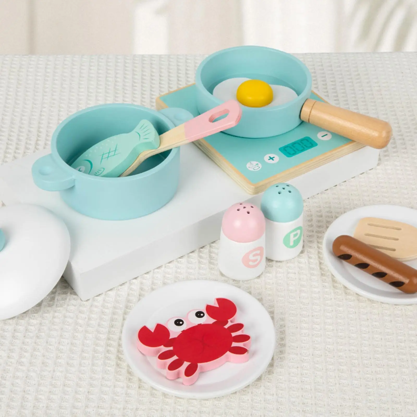 Conjunto de cozinha infantil com ferramentas de cozinha e itens alimentares