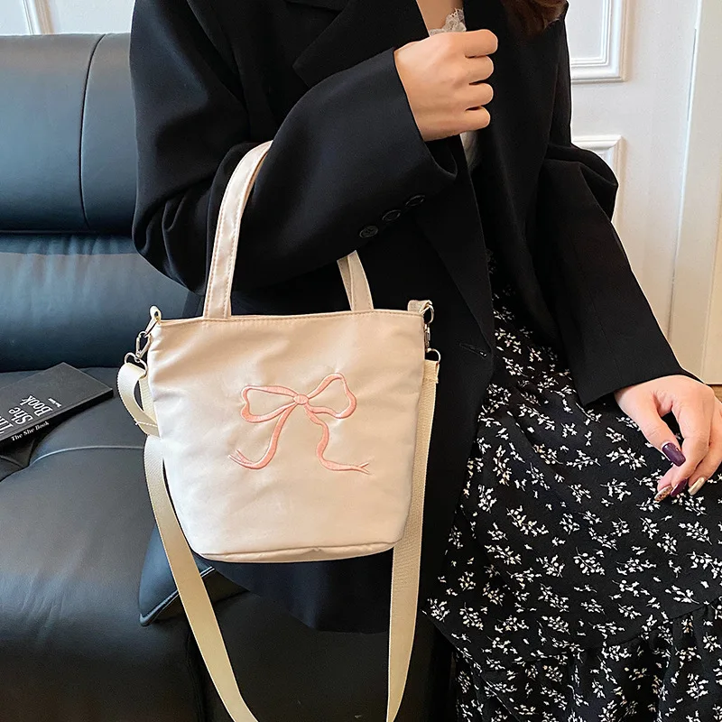 

Bow Embroidered Bucket Bag for Women's New Sweet and Western Style Handbag, Commuter Armband Handbag, Crossbody Bag