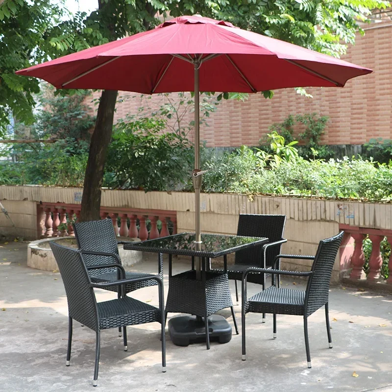 

A Outdoor furniture Courtyard Garden Restaurant Hotel plastic rattan dining table and chairs with umbrella