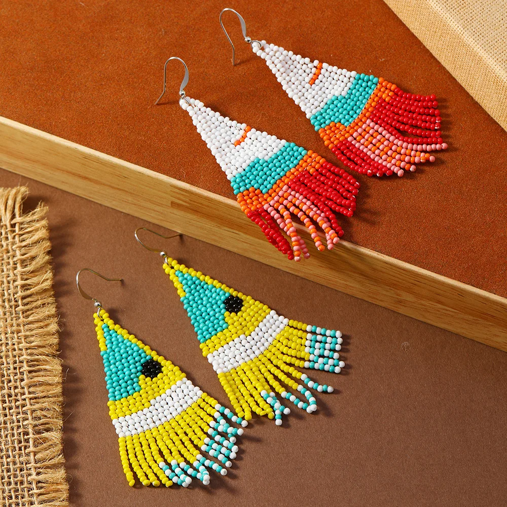 Source ethnic style retro hand-woven fringed earrings seaside vacation bohemian rice bead earrings women