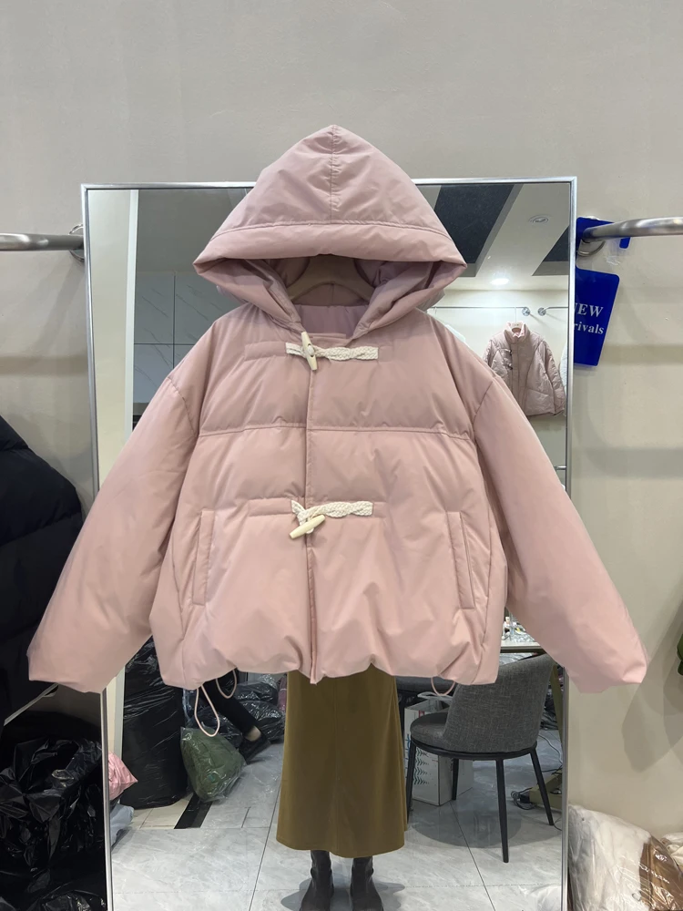 Nuovo piumino da donna con cappuccio 2023 inverno moda coreana fibbia in corno piumino d'anatra bianco manica lunga cappotto Casual caldo