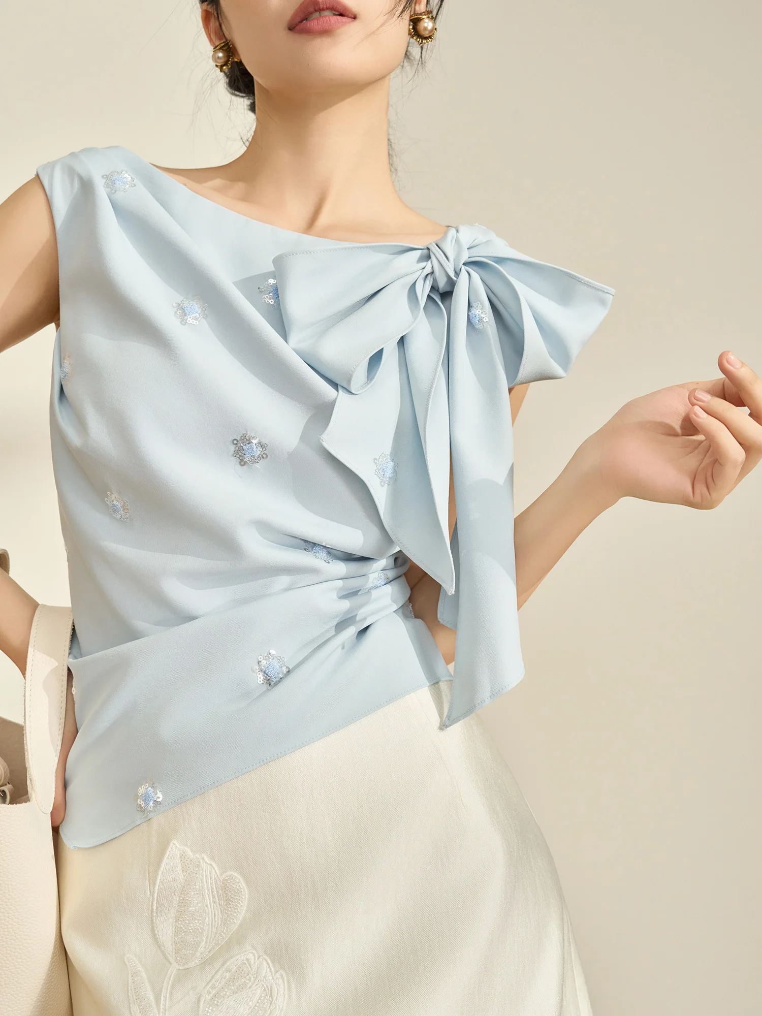 

Elegant Blue Sequin Embroidered Top with Bow Design Sleeveless Shirt for Women Stylish Commute Style Loose Fit Anti-Wrinkle