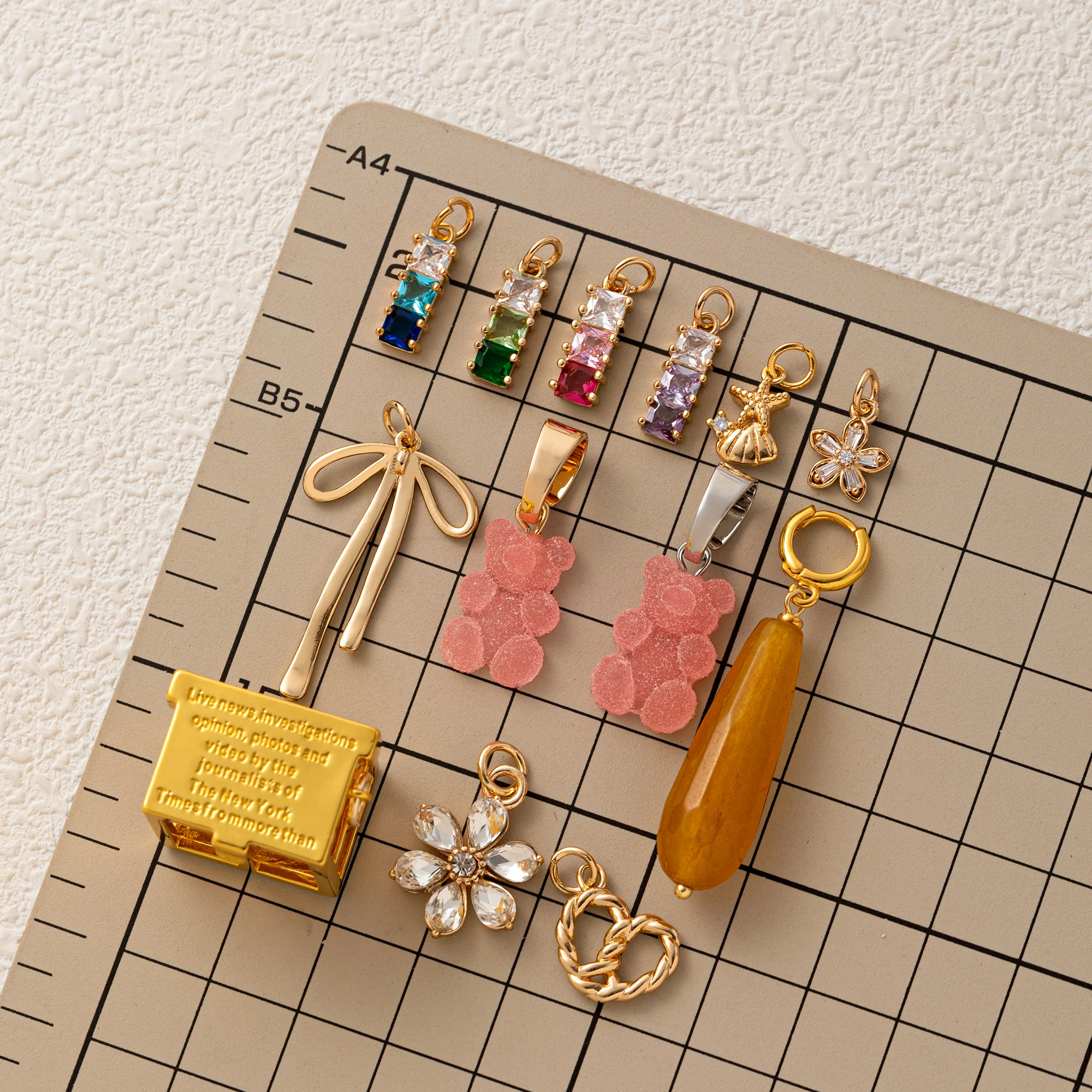 

Small and popular starfish seashells heart-shaped bags flower bows water dropletscolorful pendants charms for jewelry