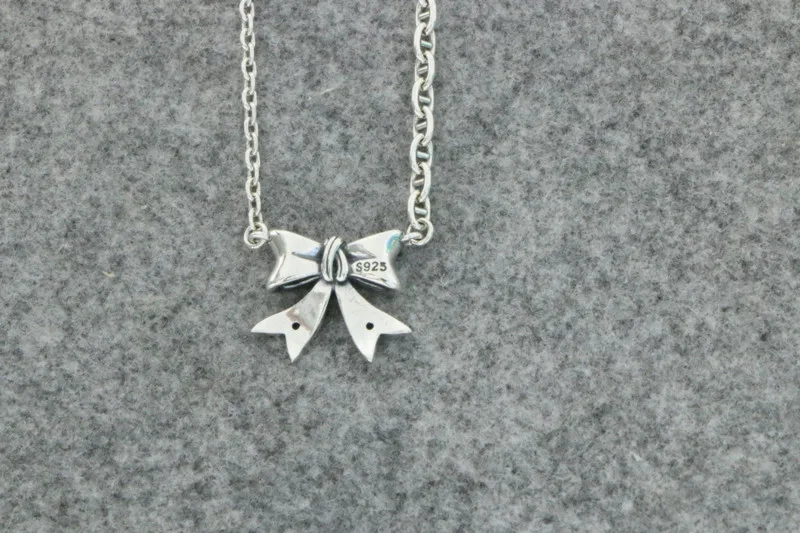 Petit collier nœud en argent regardé pour femme, pendentif d'été frais, design de luxe, fouet, clavicule de haute qualité, JOJe