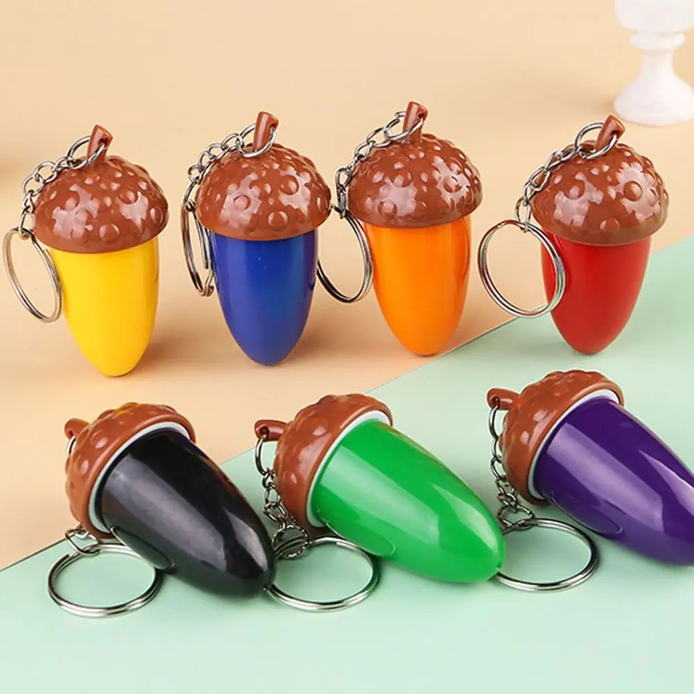 ปากกาลูกลื่นรูปทรงกรวยสนสร้างสรรค์ปากกาลูกลื่นแบบยืดหดได้พวงกุญแจทรงกรวยกล้องส่องทางไกลขนาดเล็กรางวัลของขวัญเล็กๆ