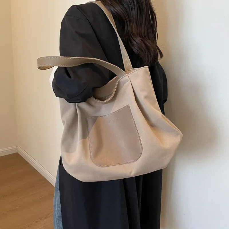 Bolso de lona sólido japonés para mujer, bolso de mano informal, versión coreana, versátil, Retro, de hombro, a la moda, nuevo