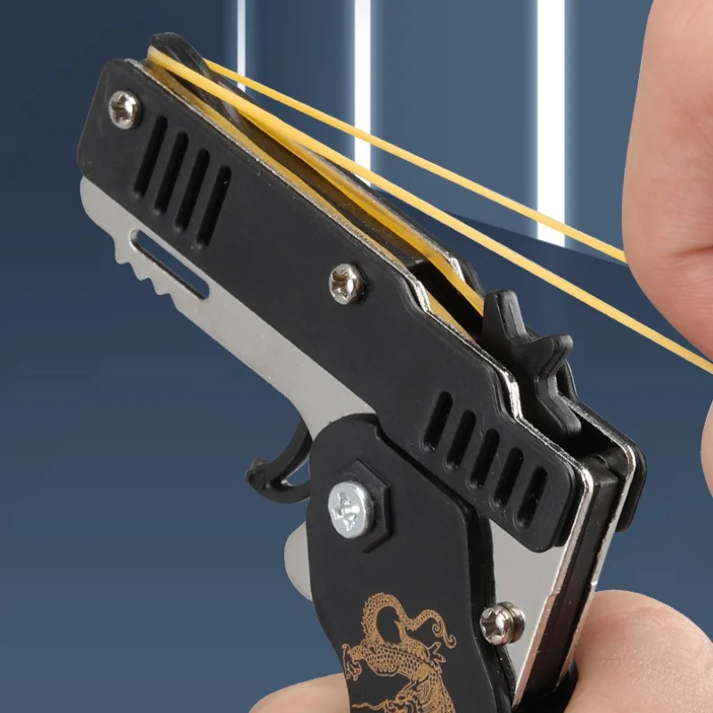 Rubberen bandpistool Kinderspeelgoed Coole sleutelhanger Mini metalen opvouwbare schietpistool Rubberen launcher Speelgoedcadeaus met 60 elastische decoraties