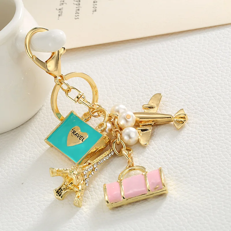 luxury jewelry New alloy pendant fashion travel handbag keychain aircraft tower accessories car bag pendant trending jewelries