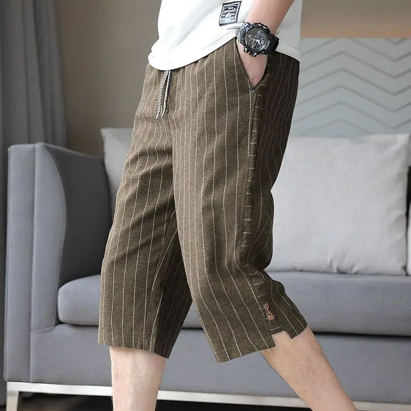 Panel de rayas de cintura alta para hombre, bolsillo suelto, informal, Delgado, recto, versátil, tres acortes, tendencia de moda de verano, 2023