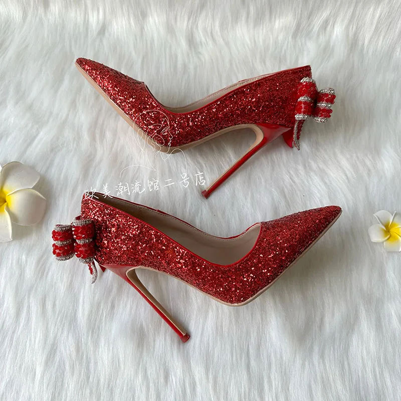 2023 New Designer Bling Red Glitter Butterfly Knot On Back Pointed Toe 12cm High Thin Heel Pump Evening Dress Shoes On Sale