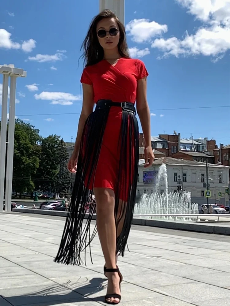 RE المرأة مثير الشرير القوطي تأثيري الحمالة حزام شرابة تنورة جلدية البرية كاوبوي فتاة عطلة نمط بولي Tassel شرابة حزام 2025