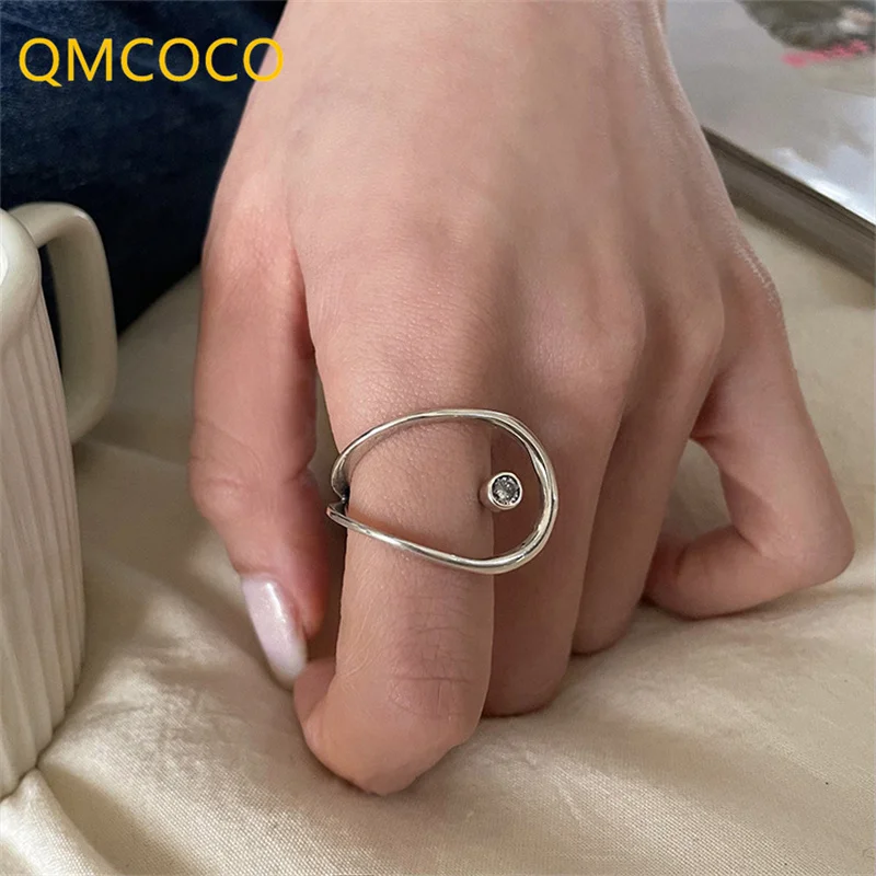 QMCOCO Minimalist Silver Color Rings For Women Fashion Exaggerated Distorted Hollow Out Lines Geometric Rings Party Jewelry