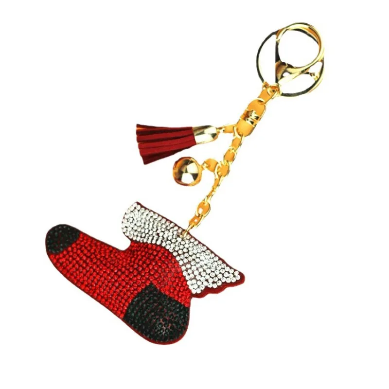 جوارب عيد الميلاد الساحرة - سلاسل المفاتيح المصممة التي تحميز أحجار الراين اللامعة وتفاصيل جرس جينغلي لإكسسوارات العطلات