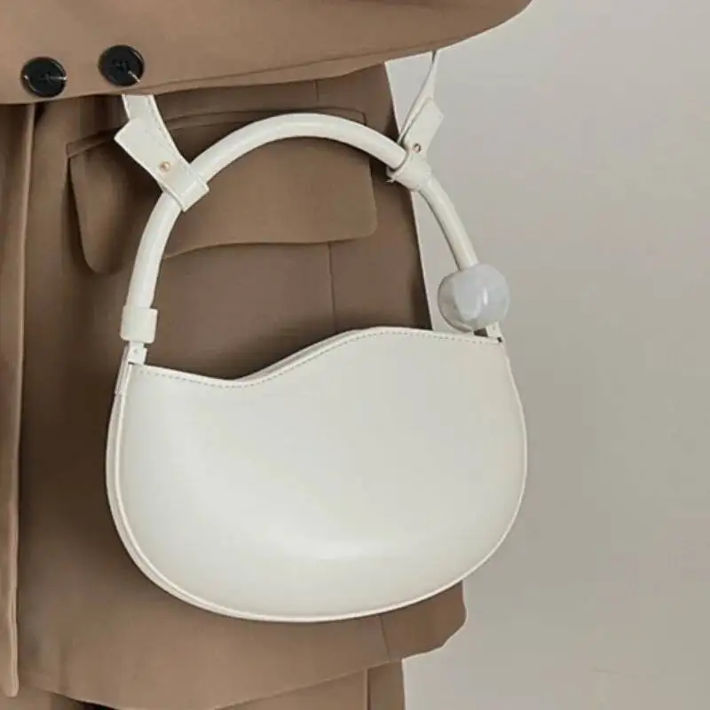 กระเป๋าถือทรงท็อปแฮนด์ ดีไซน์เรียบง่าย สไตล์ Y2K เข้าได้กับทุกชุด แฟชั่นสวยหวาน กระเป๋าถือและกระเป๋าสะพายข้างสำหรับผู้หญิง ดีไซน์เรียบหรู ทันสมัย