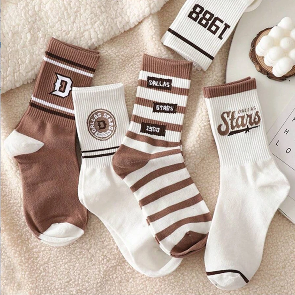 4 pairs of socks female spring and autumn students ins tide Korean version of all-in-one long tube lovers sports American suitab