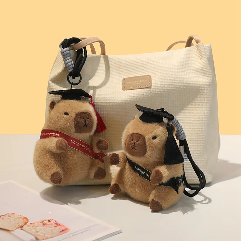 

Soft Graduation Capybara Plush Keychain Cute Stuffed Capybara with Congratulations Scarf Ideal for Grad Gifts.