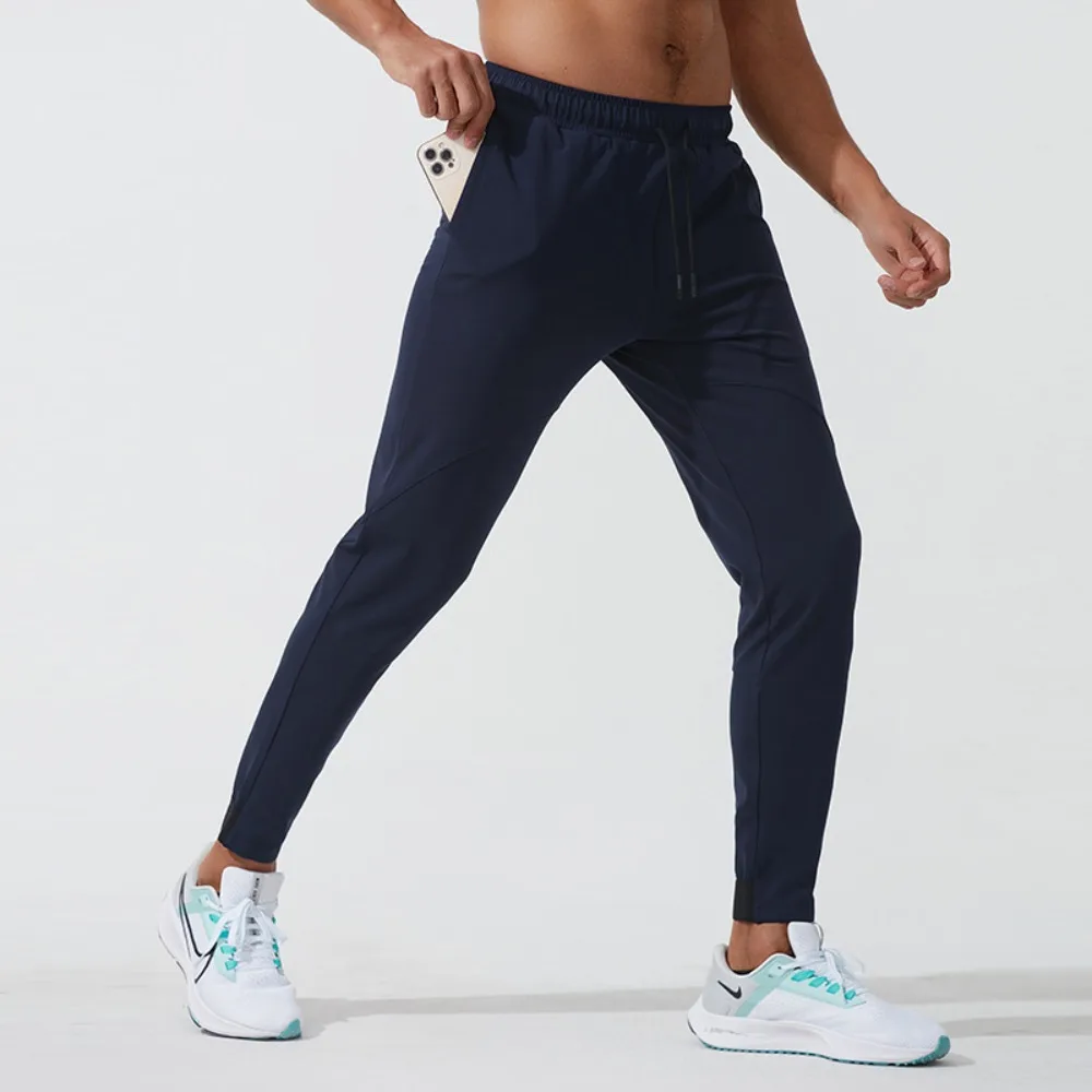 

Mens Loose Fit Running Pants Outdoor Tapered Cuff Fleece Lined Sweatpants Breathable Fabric