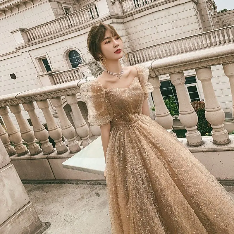 Evening dress 2026 new temperament chorus performance suit annual meeting host light luxury gold long champagne student